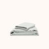 A folded organic matte sateen Mist sheet set,displayed on a white background.